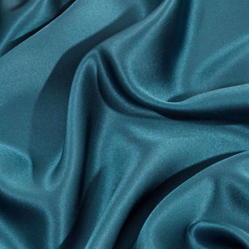 Blue silk pillowcase close up