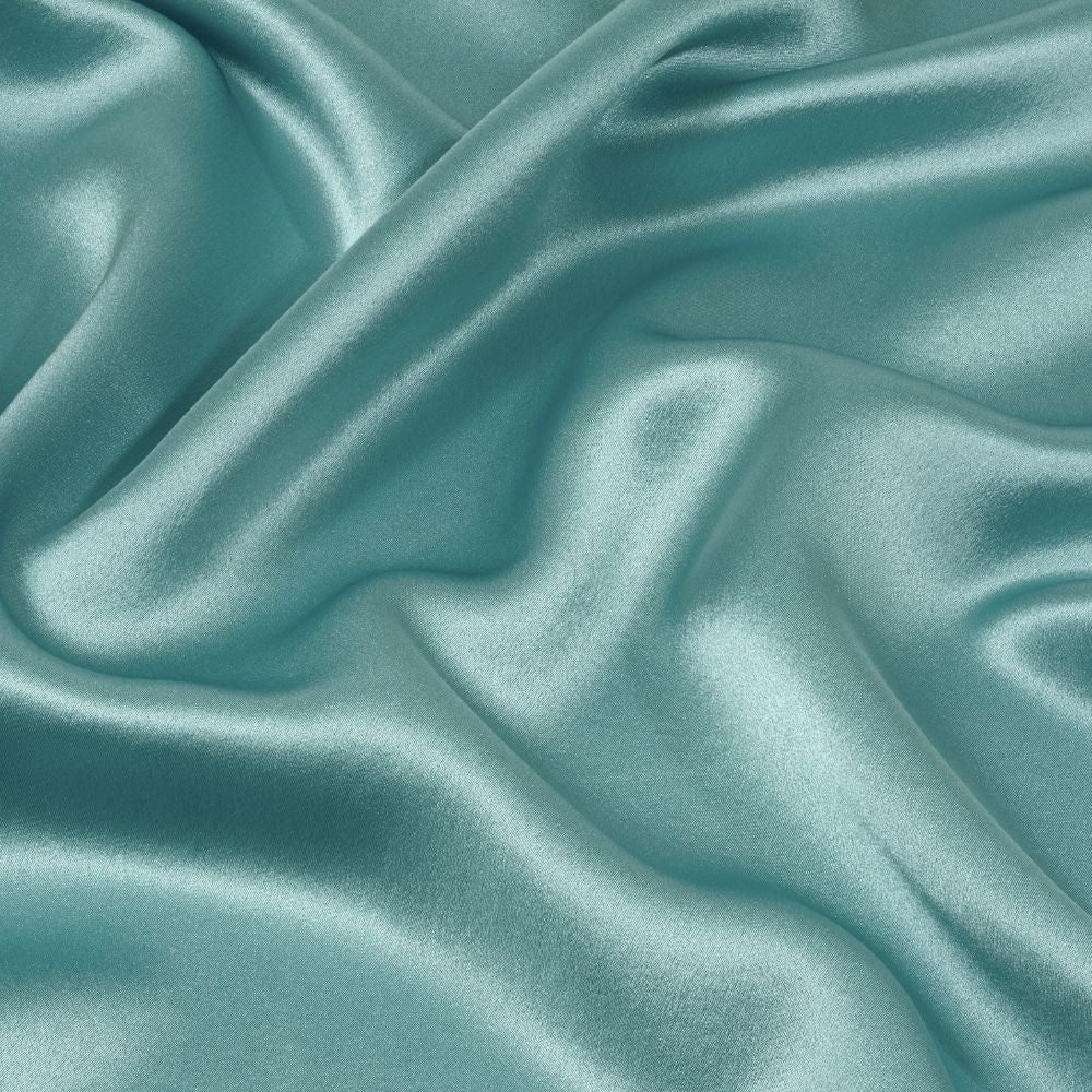 Juniper colour silk fabric with folds and reflections